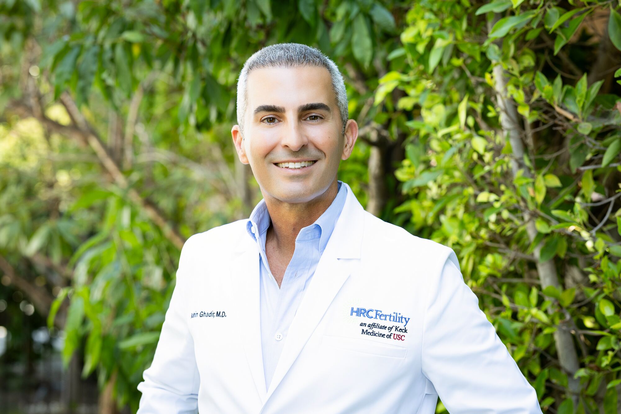 Dr. Shahin Ghadir on camera in the practice garden