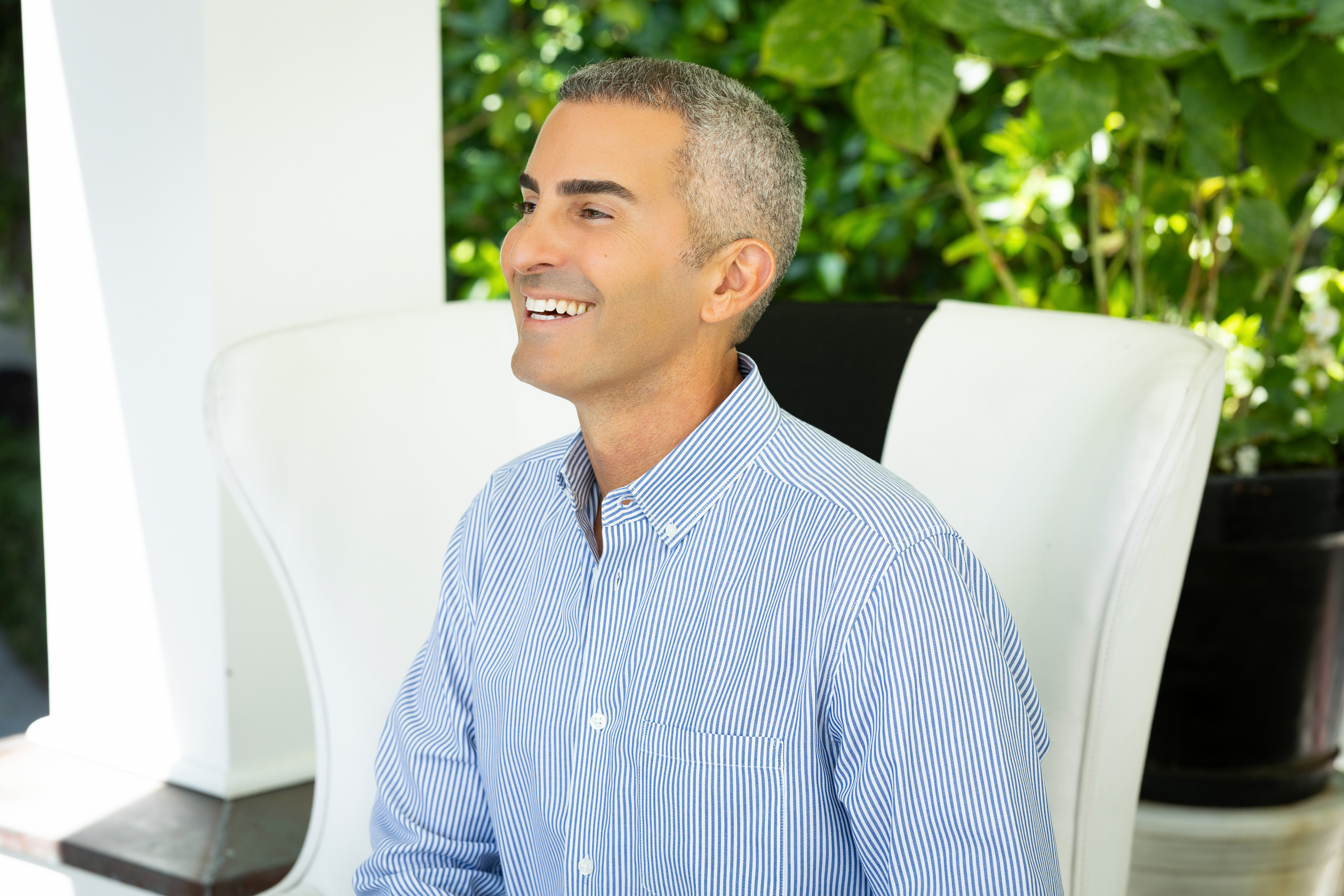 Dr. Ghadir laughing in profile